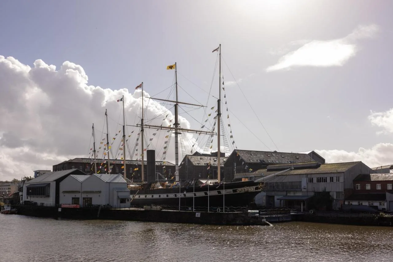 a boat docked at a dock in the water at Moxy Bristol in Bristol