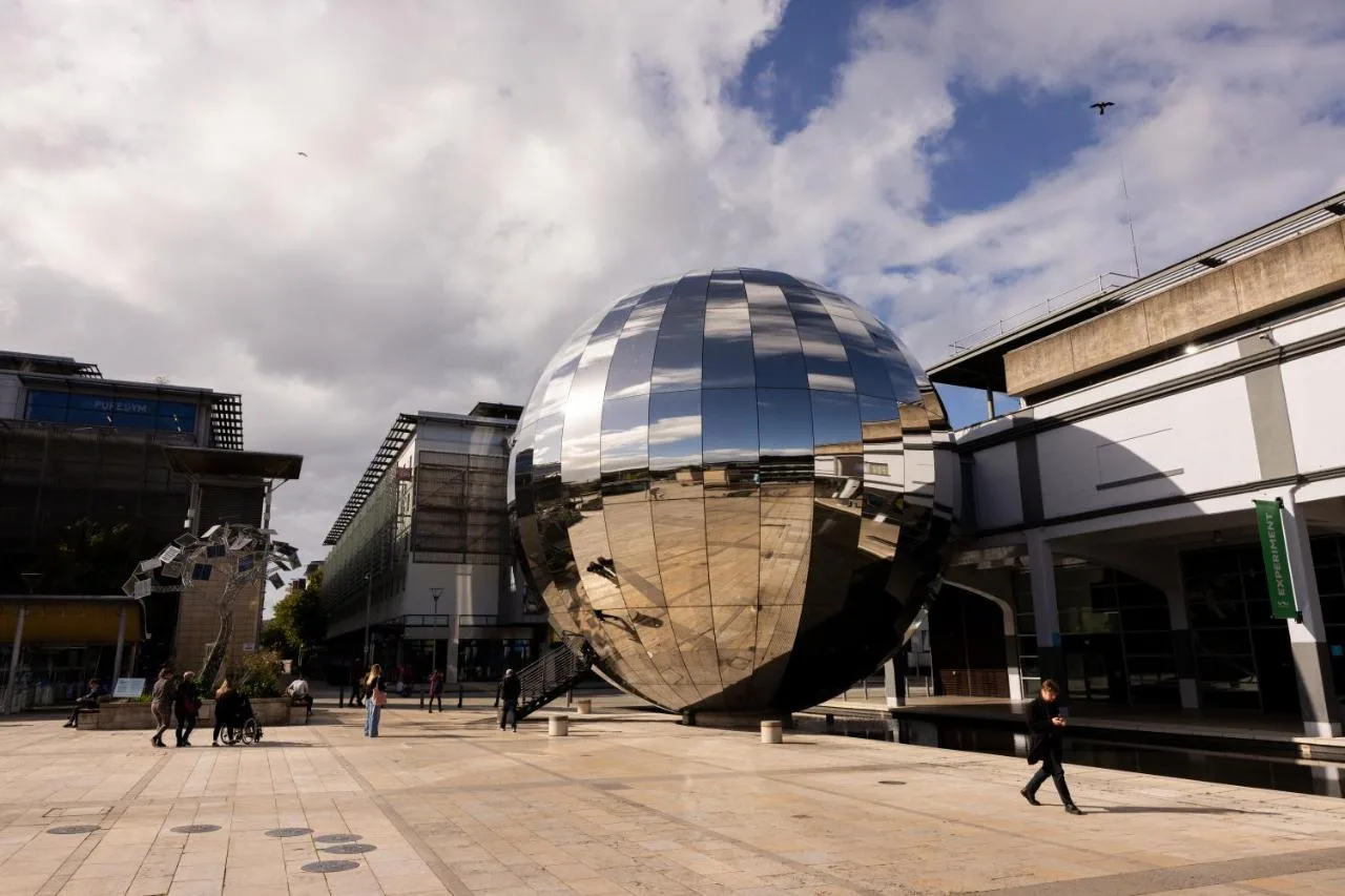 a large glass ball in front of a building at Moxy Bristol in Bristol